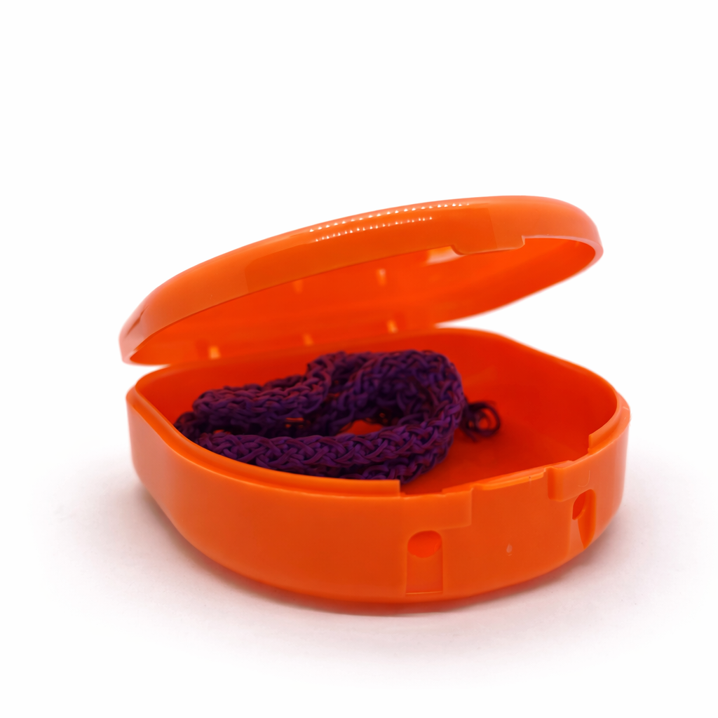 Retainer case with flat orange strap